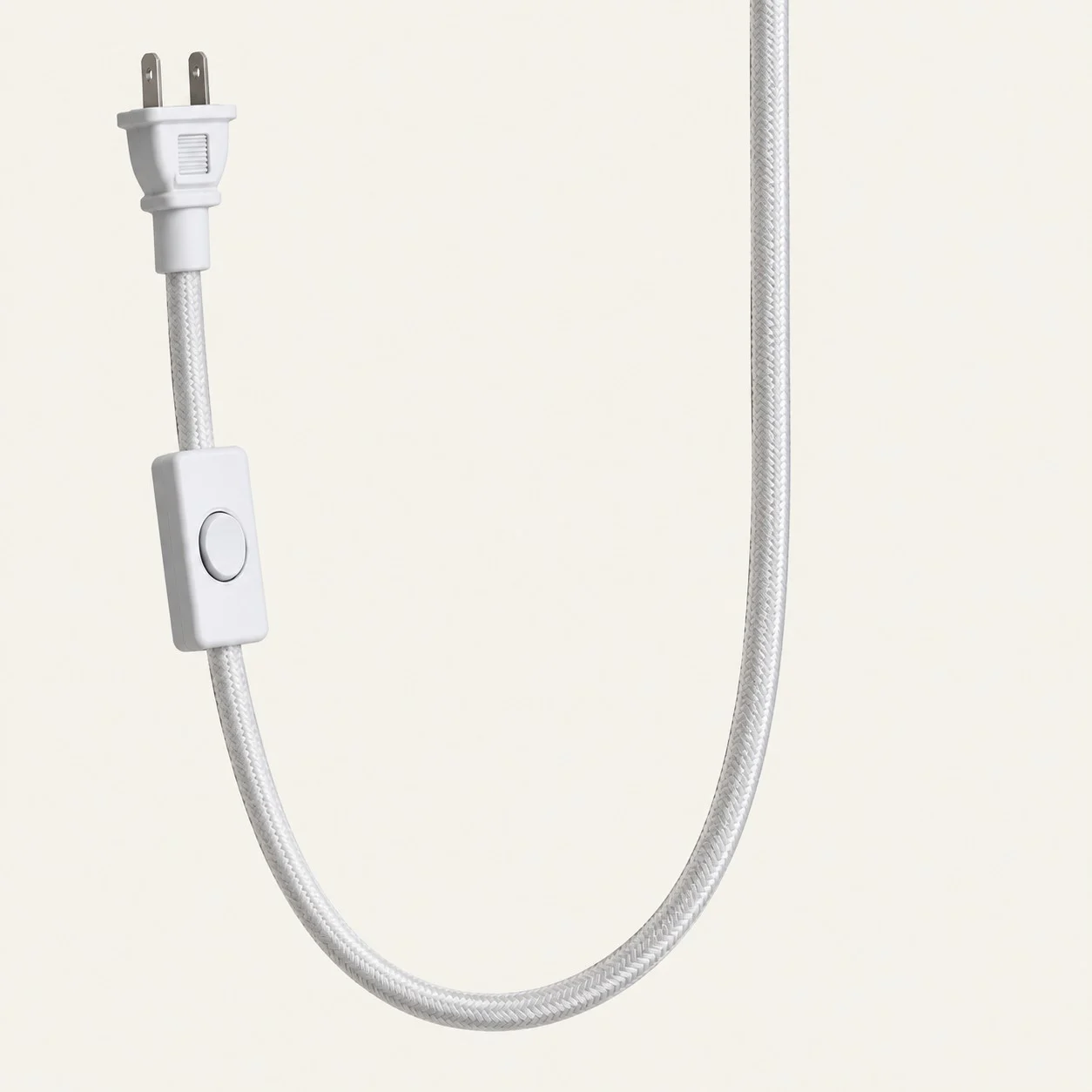 Close-up of braided plug-in cord and inline switch