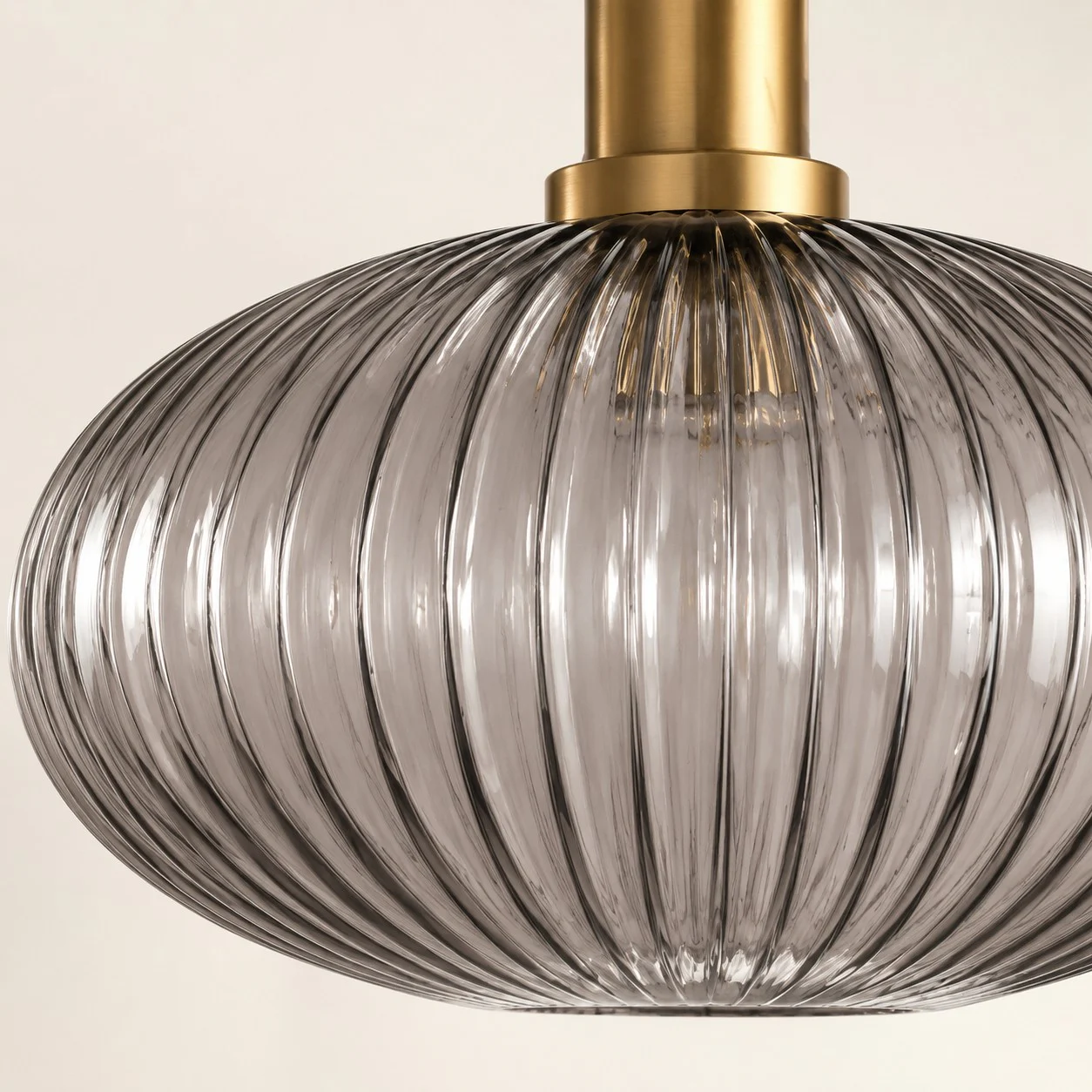 Close-up of smoky grey ribbed glass shade